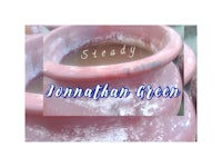 a red pot with the words jonathan green on it
